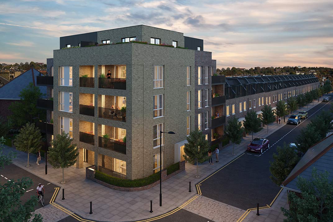A modern four-storey block of flats with balconies stands at a street corner, surrounded by trees and adjacent to a row of terraced houses at dusk.